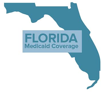 A blue map of florida with the words " florida medicaid coverage ".